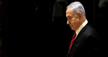 Netanyahu formally charged over graft after dropping immunity bid