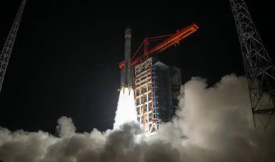 China launches 15 new satellites