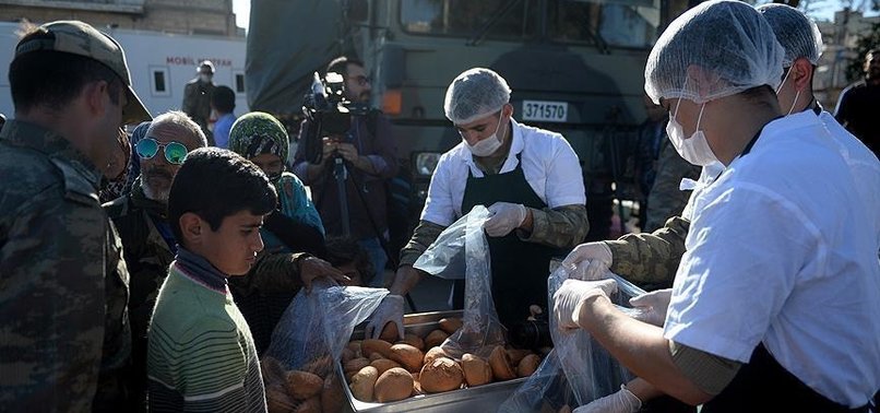 TURKISH SOLDIERS DISTRIBUTE BREAD IN SYRIAS AFRIN