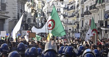 Algerians flood streets to mark protest movement's first birthday