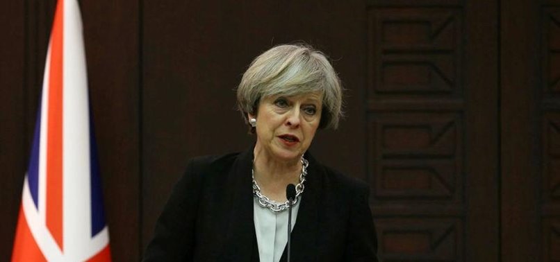 PM MAY SAYS UK MUST DO MORE TO COMBAT EXTREMISM