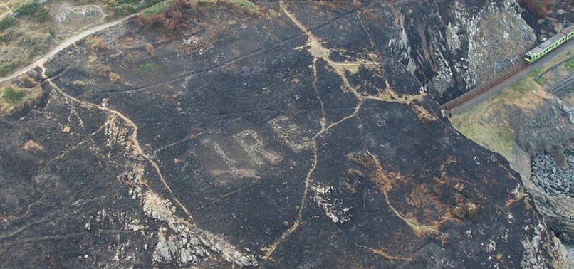 HIDDEN GIANT WWII WARNING SIGN UNCOVERED IN IRELAND WILDFIRE