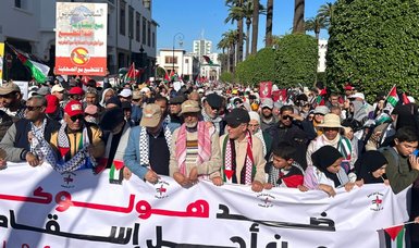 Thousands of pro-Palestinian protesters march in Rabat streets to call for severing of ties between Morocco and Israel
