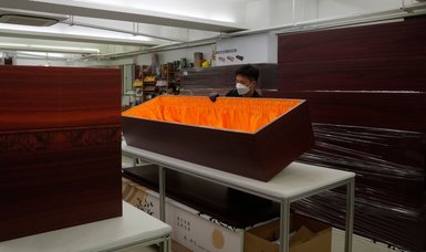 Hong Kong's COVID toll leads some to eco-friendlier coffins