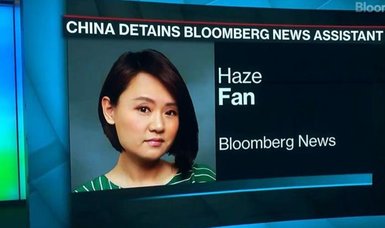 China says Bloomberg news assistant in Beijing released