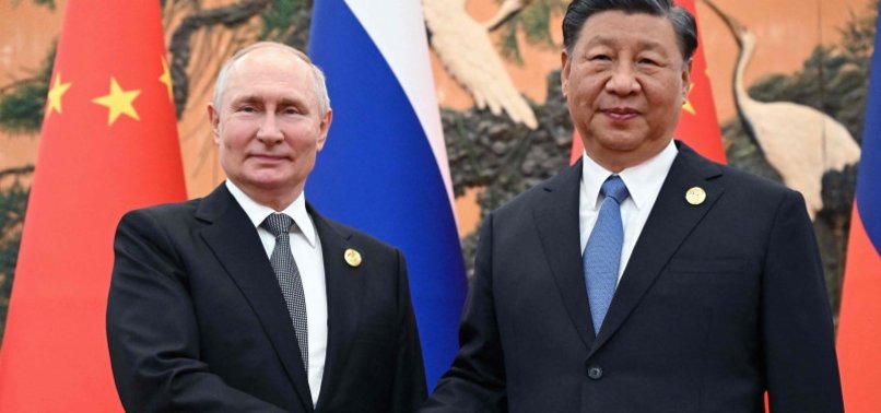 PUTIN AND XI TO FOCUS ON GLOBAL AND REGIONAL SECURITY AT CHINA TALKS, SAYS RIA