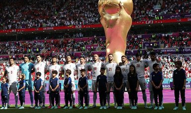 Iran players resume singing of national anthem at World Cup match