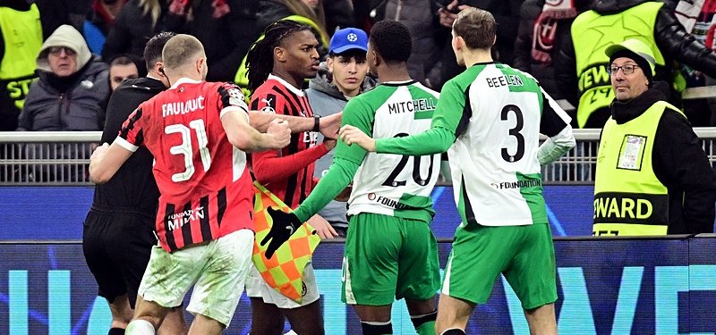 Feyenoord knock out 10-man AC Milan to reach Champions League last 16