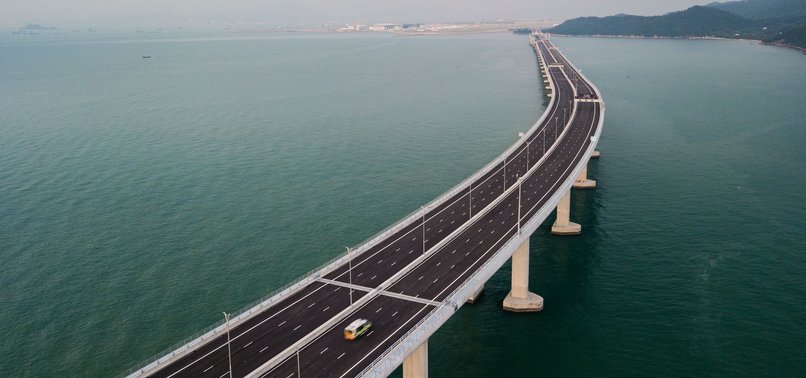 CHINA OPENS WORLDS LONGEST SEA BRIDGE LINKING HONG KONG TO MAINLAND