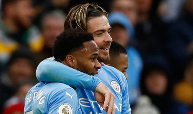 Sterling penalty earns leaders Man City win over 10-man Wolves