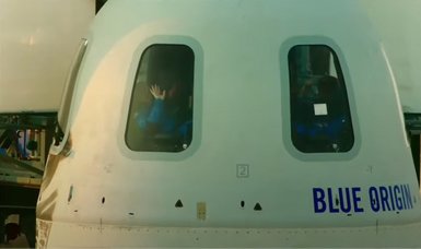 Blue Origin launches artwork, moon-landing test into space