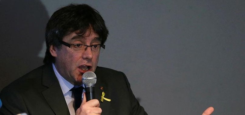 EX-CATALAN LEADER PUIGDEMONT URGES DIALOGUE WITH SPAIN