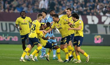 Fenerbahce win at Trabzonspor in match marred by clashes