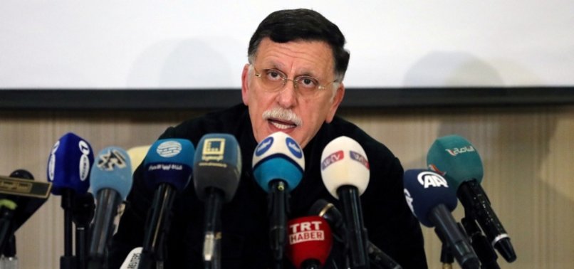 LIBYAS GOVERNMENT ANNOUNCES CEASE-FIRE, CALLS FOR ELECTIONS