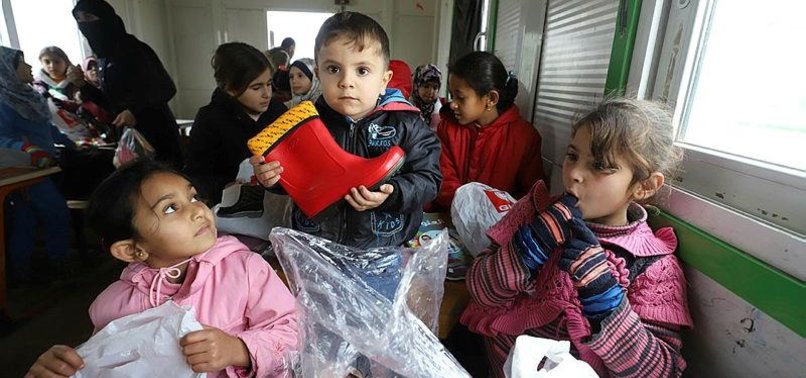TURKISH AID GROUP DISTRIBUTES WINTER AID IN SYRIA