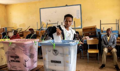 Kenyans voting for president and parliament in close election