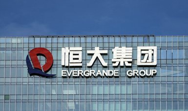 China Evergrande bondholders receive overdue bond coupon payments