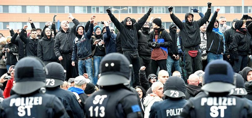 GERMAN POLICE CARRY OUT DOZENS OF DAWN RAIDS ON FAR RIGHT CRIME NETWORK