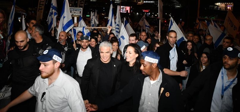 FORMER PM YAIR LAPID JOINS MASS RALLY AGAINST NETANYAHU GOVT