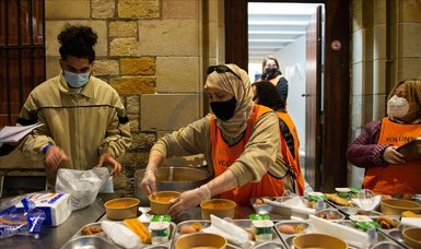 Muslims in Barcelona gather in Catholic church's cloister for iftar meals