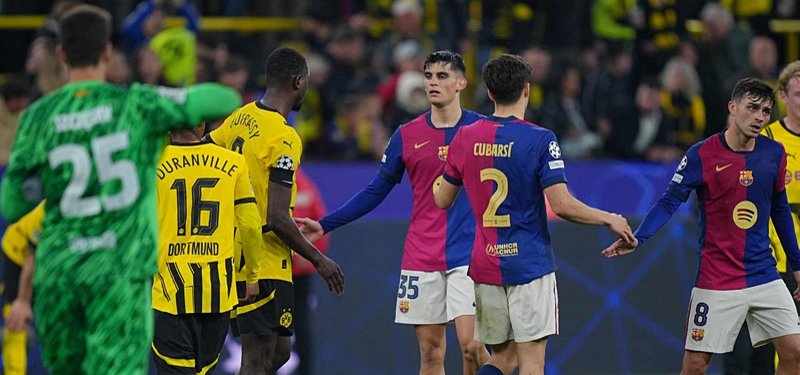 Barcelona reach Champions League semis despite defeat at Dortmund