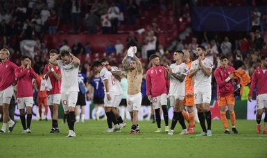 Sevilla sink Copenhagen 3-0 to stay alive in Champions League
