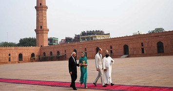 William and Kate play cricket and tour mosque in Pakistan's Lahore