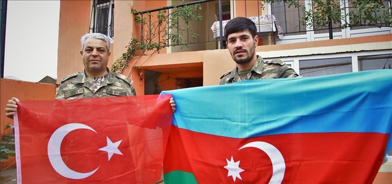 AZERI FATHER AND SON JOIN MILITARY OPERATION TO LIBERATE KARABAKH VILLAGE FROM ARMENIAN OCCUPATION