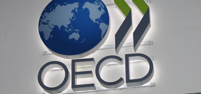 OECD HIKES GLOBAL GROWTH FORECAST FOR 2023, 2024