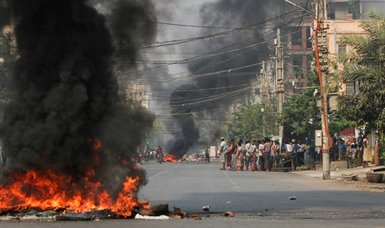Myanmar forces kill dozens of protesters in deadliest day since February 1 coup