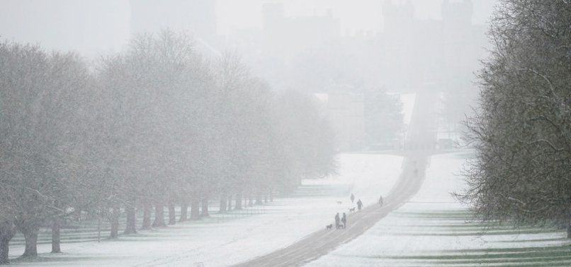 TRAIN, FLIGHT CANCELLATIONS REPORTED AS SNOW BLANKETS BRITAIN