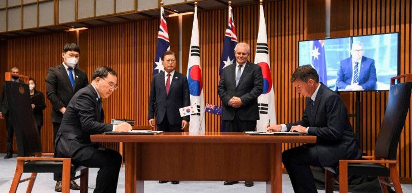 AUSTRALIA AND SOUTH KOREA SIGN DEFENSE DEAL AS LEADERS MEET