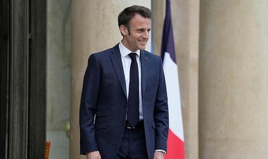 Emmanuel Macron signs France pension law despite protests