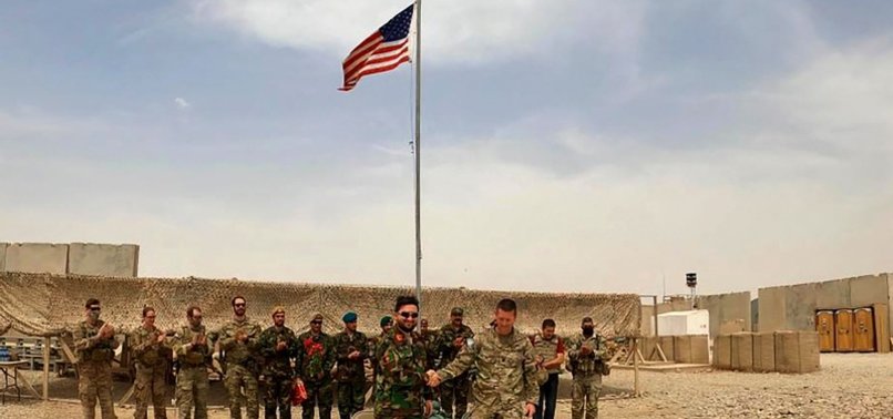 US FORCES HAND OVER KEY BASE TO AFGHAN FORCES