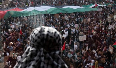 Thousands of protesters join in large pro-Palestinian rally in Washington to condemn Biden war policy
