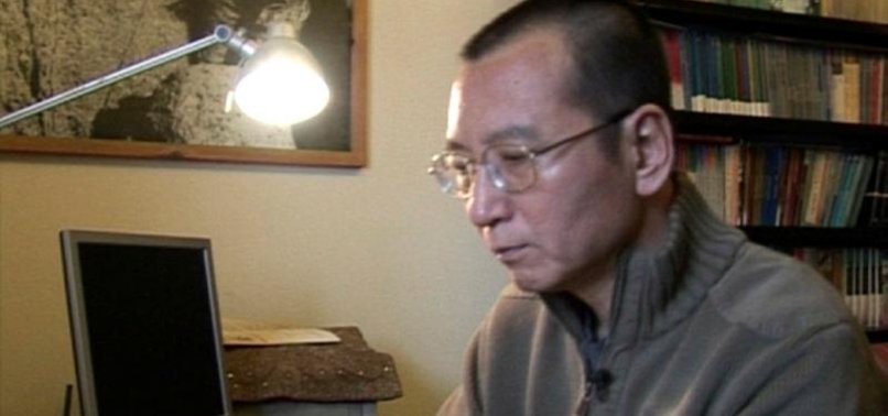 CHINESE NOBEL LAUREATE TOO SICK TO TRAVEL ABROAD