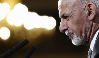 Former Afghan president apologizes for abandoning his country