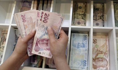Stocks, lira gain ground on Turkish interest rate hike