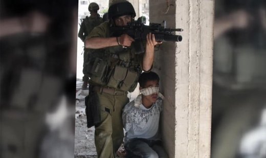 Israeli soldiers using Palestinian civilian in Gaza as human shield - footage