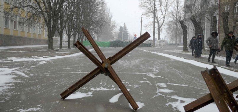 IN UKRAINES DESERTED CITY, FLORIST STAYS OPEN TO CHEER PEOPLE UP
