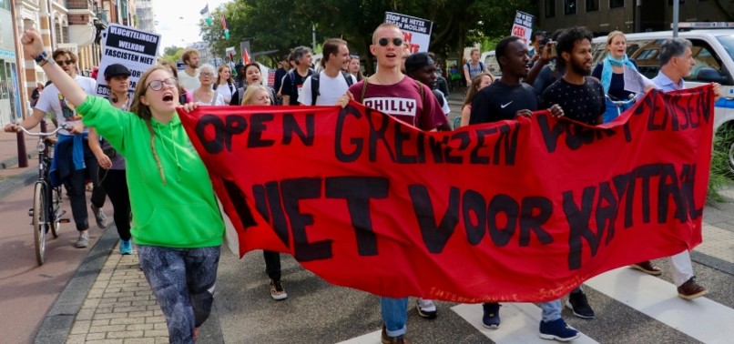 EU migrant and refugee policies spark protests in Amsterdam - anews