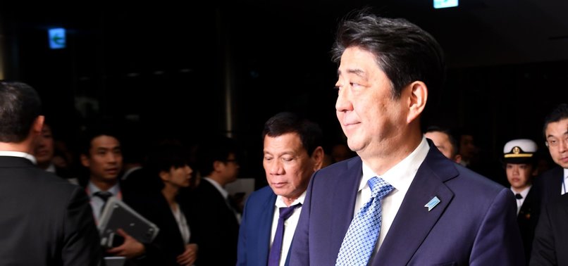 JAPANS ABE RE-ELECTED AS PRIME MINISTER AFTER LANDSLIDE ELECTION VICTORY