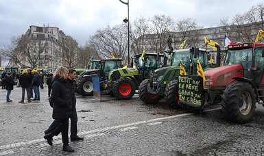 Tractors roll into Paris as farmers up pressure on Macron