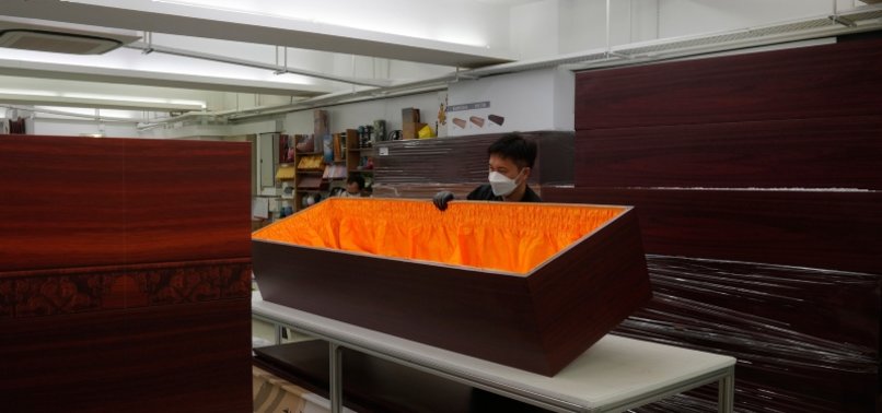HONG KONGS COVID TOLL LEADS SOME TO ECO-FRIENDLIER COFFINS