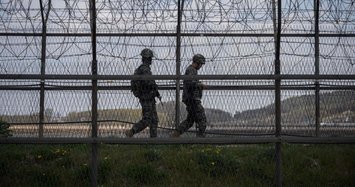 North and South Korean troops exchange fire along border