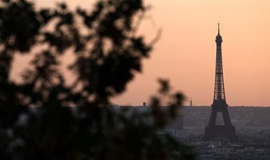 Firefighters battling blaze near Eiffel Tower