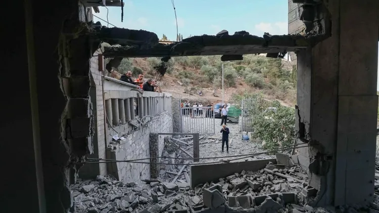 Israeli forces demolish apartment during raid in Nablus