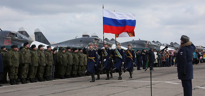 PUTIN ORDERS WITHDRAWAL OF RUSSIAN TROOPS ON SURPRISE SYRIA VISIT