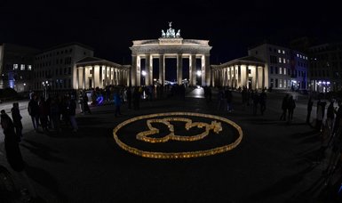 Lights go out at landmarks around the globe to mark Earth Hour