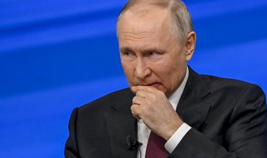 Putin vows to deliver severe consequences for any foreign meddling in upcoming Russia election